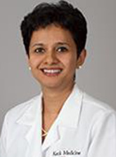 Dr. Manju Aron